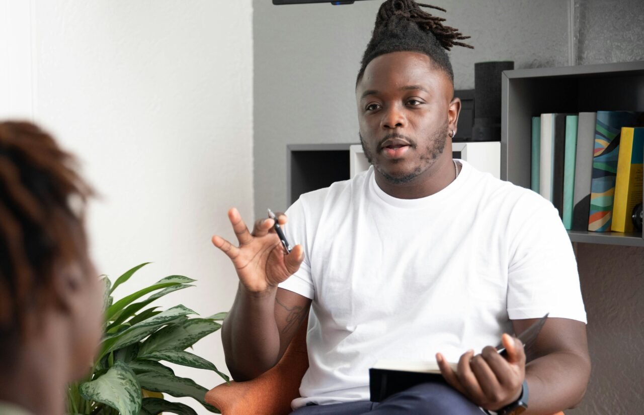 man talking to patient