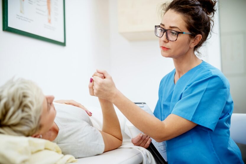 nurse treating woman